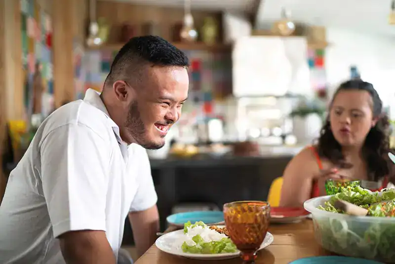 Empowering Weight Loss: A Comprehensive Guide for Individuals with Disabilities 2 Image of a disabled man and balance around nutrition to aid weight loss Wickford