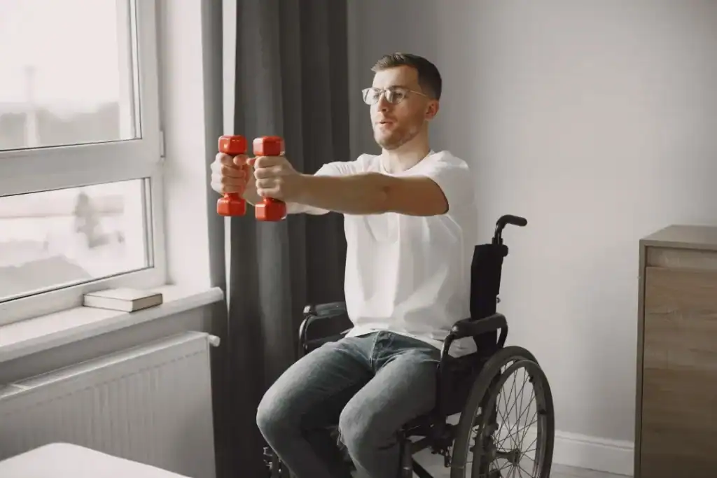 Image of man doing exercise in his wheelchair to aid weight loss Wickford